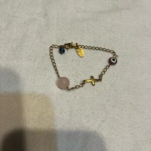 Fashion bracelet brass colored metal:evil eye beads,pink bead, cross bracelet